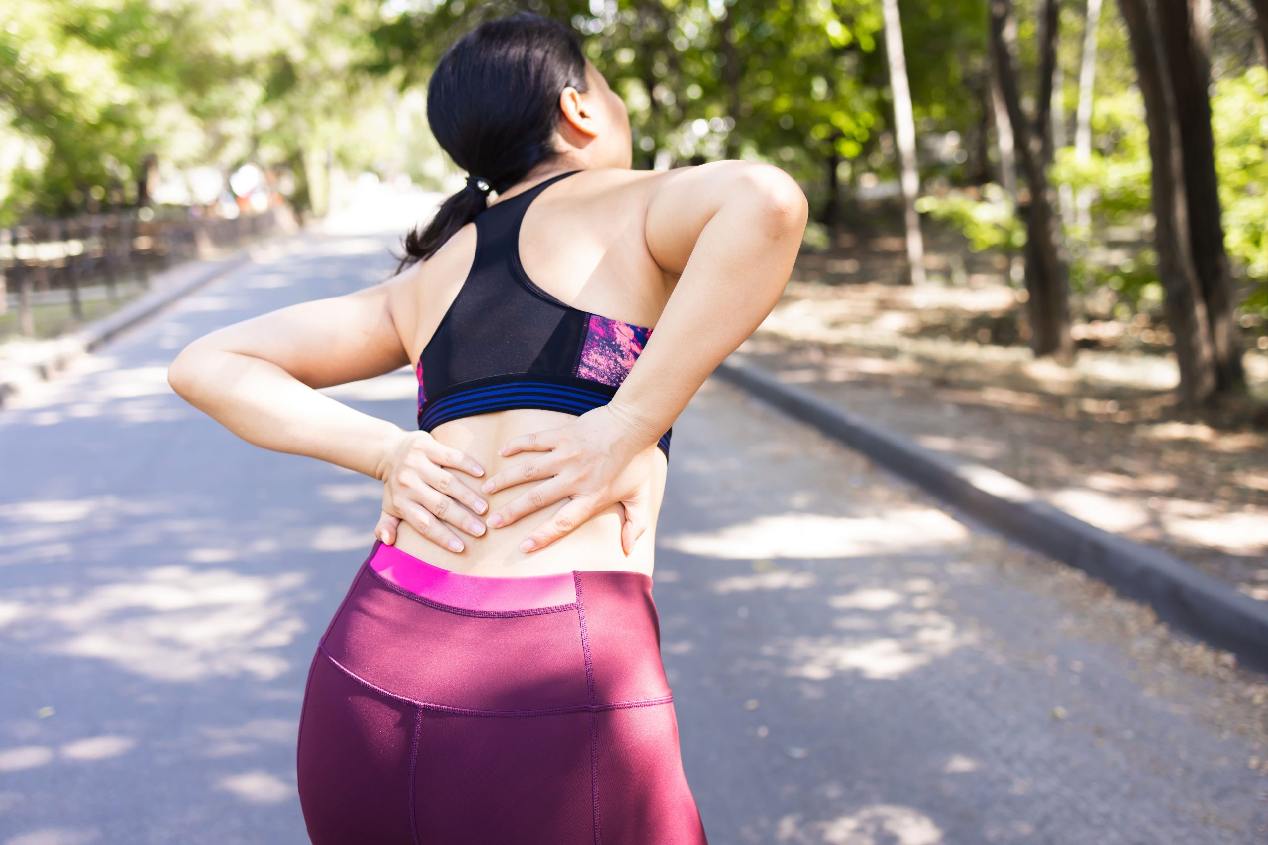 Image young asian woman exercising in the park pain in t 2026 03 24 10 13 58 utc (1)